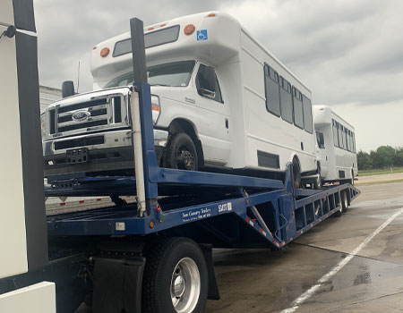 RVs loaded on a trailer for transport, showcasing professional RV shipping services across the U.S.